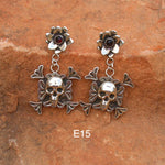 E15 Desert Flower Chama Overlay Skull Earrings